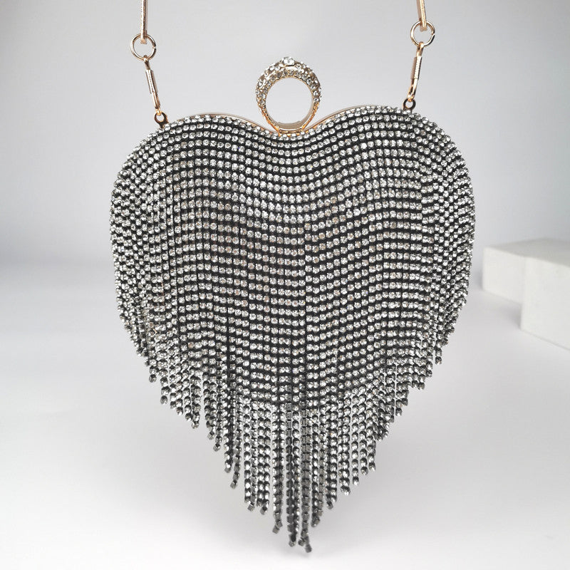 Damenhandtasche mit eingelegten Diamanten und Quasten