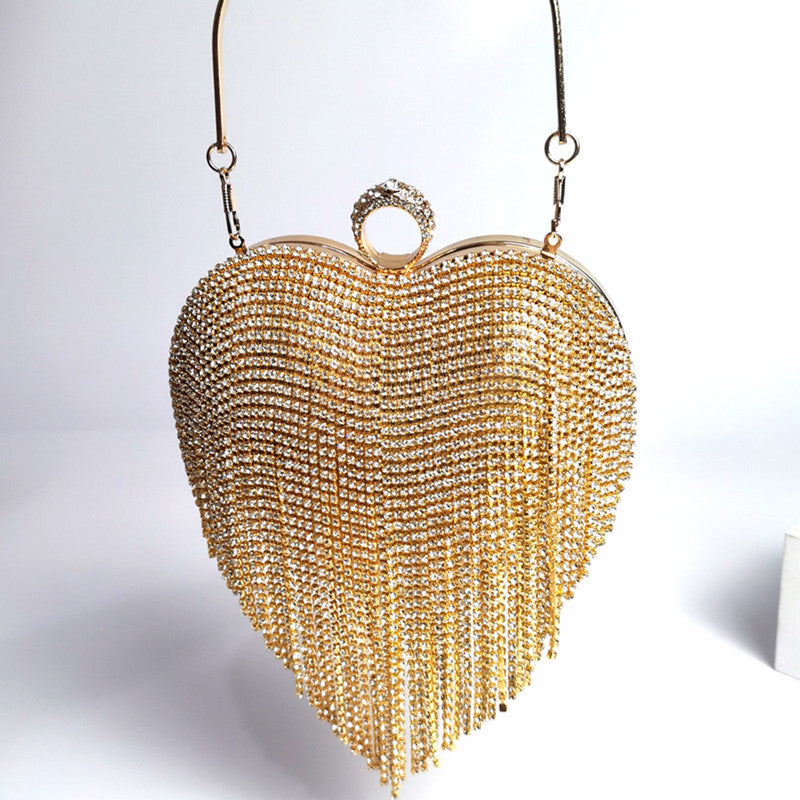 Damenhandtasche mit eingelegten Diamanten und Quasten