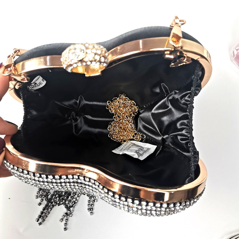 Damenhandtasche mit eingelegten Diamanten und Quasten