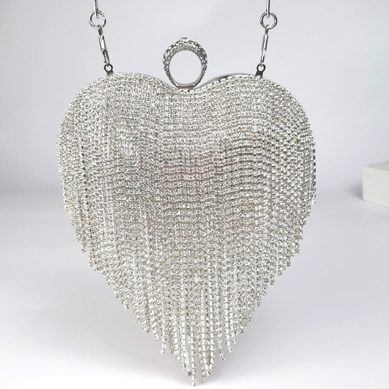 Damenhandtasche mit eingelegten Diamanten und Quasten