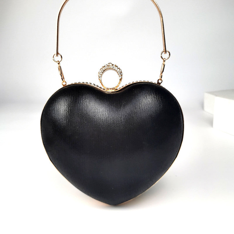Damenhandtasche mit eingelegten Diamanten und Quasten
